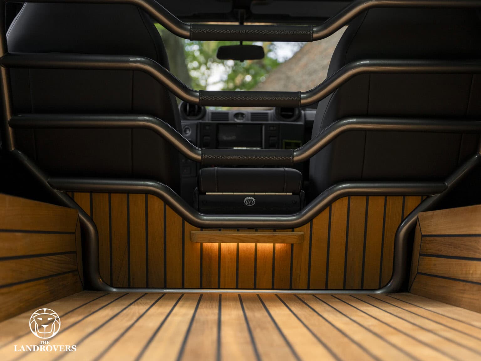 reclaimed teak wood interior of a custom build Defender Panterra