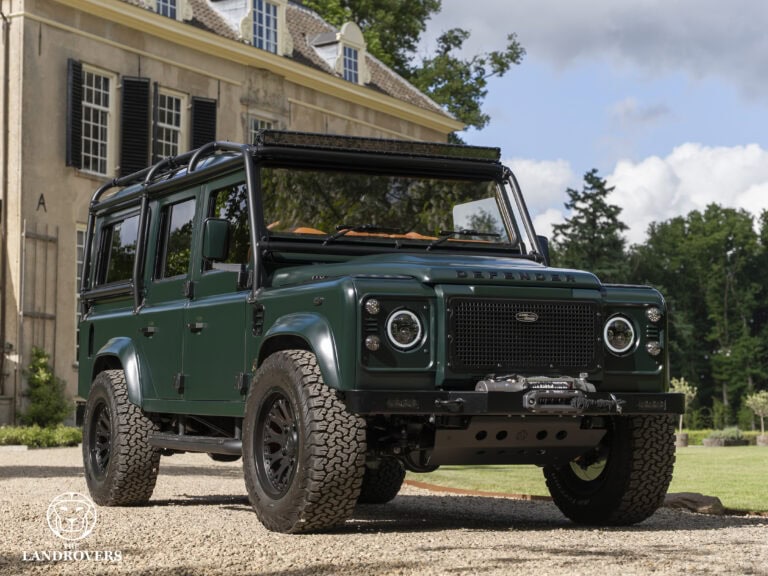 The best land rover defender build in the world in front of a classic castle