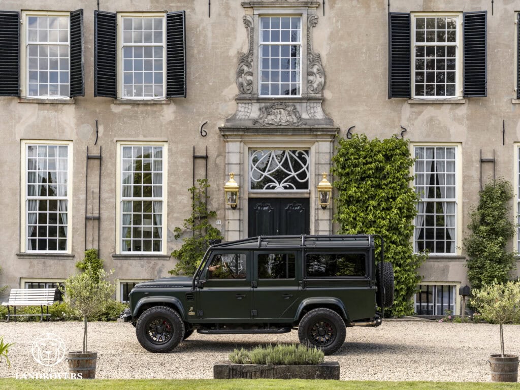 The best land rover defender build in the world in front of a classic castle