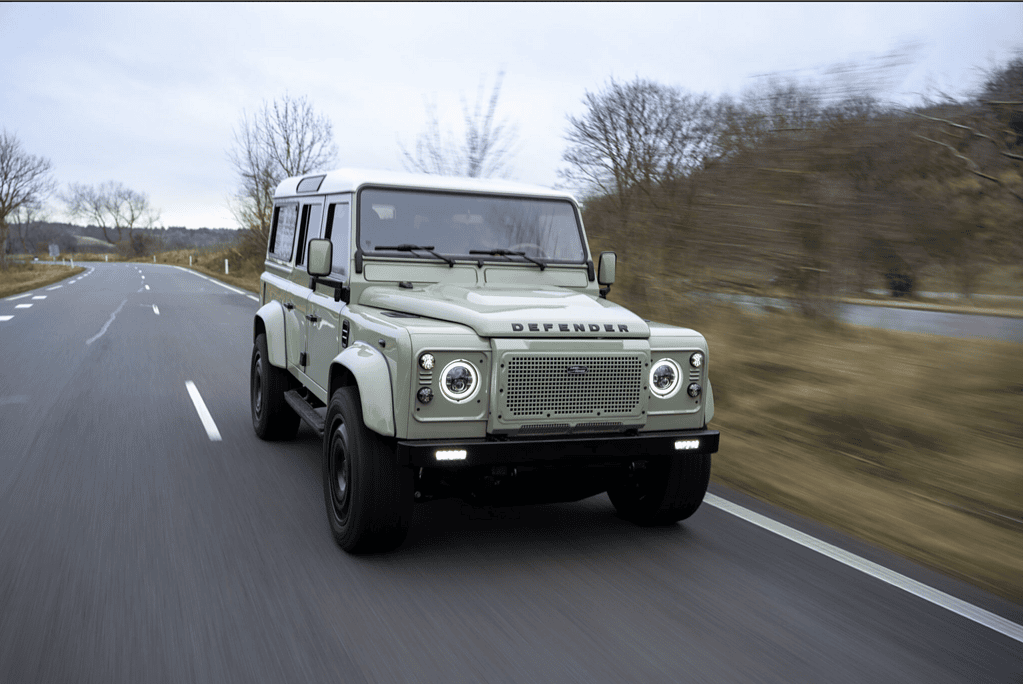 Top gear journalist driving Defender Panterra on road